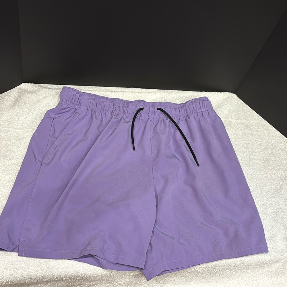 Two in one. Bathing suit and shorts. Brand is “Alive”